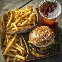 Delicious Burger Meal Explore the Ultimate Fast Food Indulgence with a Juicy Double Cheeseburger, Crispy Golden French Fries, and Refreshing Iced Tea Perfect for Lunch or Dinner, this Classic Combo photo