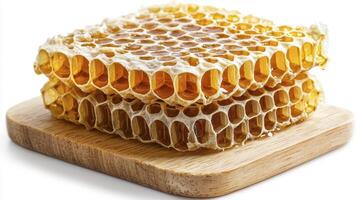 Discover the golden sweetness of honeycomb, a natural wonder created by bees Explore the intricate hexagonal structure of the comb filled with delicious honey This image captures the raw, unfiltered photo
