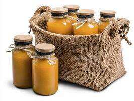 Discover the vibrant allure of golden juice nestled in rustic burlap, a captivating still life that evokes feelings of warmth and natural goodness Explore the rich textures and inviting colors of photo