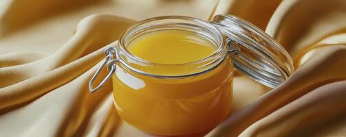 Golden Ghee in Glass Jar A Culinary Delight Discover the rich flavor and health benefits of pure ghee, captured in a stunning still life Ideal for recipes, wellness blogs, and food photography photo