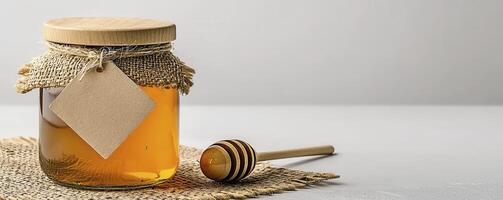 Golden Honey in a Glass Jar A Sweet and Natural Still Life, Perfect for Food Bloggers, Health Enthusiasts, and Nature Lovers Featuring a Wooden Lid, Burlap Accent, and Honey Dipper, this image photo