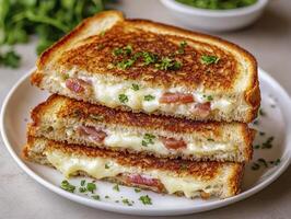 Indulge in the ultimate comfort food experience with this irresistibly golden and cheesy grilled cheese sandwich, a culinary masterpiece featuring perfectly toasted bread, melty cheese, and savory photo