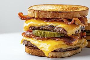 Indulge in the Ultimate Grilled Cheese Burger A Delectable Feast of Sizzling Beef Patties, Melted Cheddar Cheese, Crispy Bacon Strips, and Tangy Pickles, all Nestled Between Two Golden-Brown photo