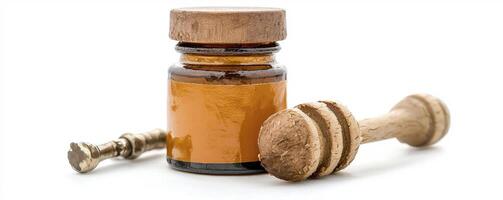 Natural Honey Jar Still Life Discover the Golden Essence of Pure Honey, captured in this serene image A wooden honey dipper rests beside a glass jar, filled with luscious, golden honey Perfect for photo