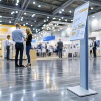 A bustling corporate event unfolds in a symphony of blurred motion, capturing the vibrant energy and dynamic interactions that define professional gatherings Attendees engage in animated photo