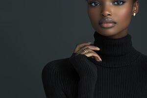 A captivating portrait showcases a woman's elegance against a muted backdrop She wears a sleek black turtleneck sweater, emphasizing her smooth skin and refined features Delicate gold rings adorn her photo