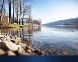 A serene aquatic landscape unfolds, where the river acts as a flawless mirror, reflecting the expansive sky above with pristine clarity The horizon blurs the distinction between water and sky photo