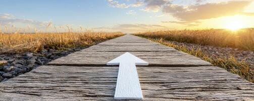 A straight wooden path leading towards a bright horizon symbolizes direction, purpose, and journey The white arrow superimposed guides the viewer's eye, adding a sense of intentionality and forward photo
