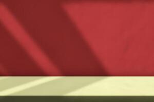 Table with Light Beam and Shadow on Red Wall Background photo