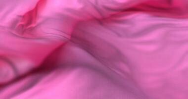 Pink cloth or silk waving at wind in slow, loop video