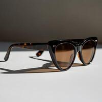 close up Black cat eye sunglasses retro style fashion accessory close up on white background modern summer eyewear design photo