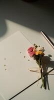 Elegant minimalist empty card copy space with the tied flower bouquet in soft natural sunlight casting delicate shadows photo