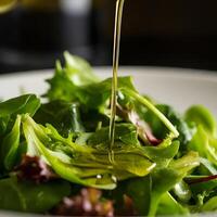 Drizzling extra virgin olive oil over fresh leafy greens vibrant healthy salad in a macro close up culinary focus photo