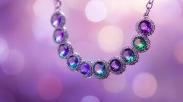 Elegant multicolored gemstone necklace with sparkling jewels on purple bokeh background photo