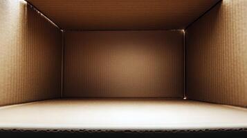 Empty brown cardboard box interior with corrugated texture and warm lighting photo