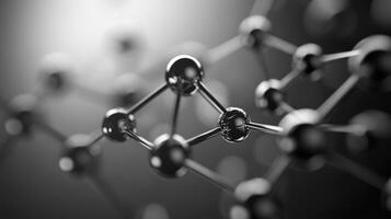 Abstract molecular structure in black and white with metallic spheres and connecting rods photo
