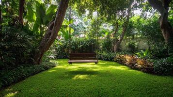 Serene garden swing amidst lush greenery in sunlit forested area photo