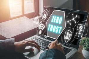 zero trust security concept, Person using computer with zero trust icon. photo
