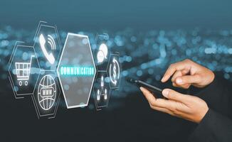 Communication concept, Business hand using smart phone with communication icon on virtual screen. photo