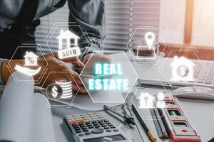 Real estate, Buy house concept, Person hand using smartphone and choosing home with parameters of price, Location, Efficiency rating and property value. photo