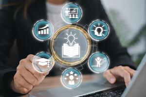 A modern depiction of the knowledge concept with digital icons symbolizing learning, innovation, and growth in a business setting. photo