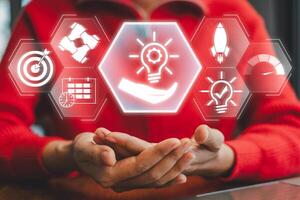 Visual representation of innovative solutions with futuristic icons and hands, symbolizing creativity and problem-solving. photo