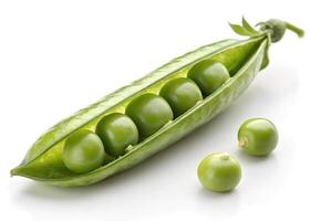 An open green pea pod displays several round peas inside on a white surface photo