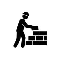 A black and white image of a man building a brick wall vector