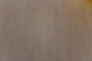 Unique texture of a soft surface highlighting subtle variations in color and pattern under warm lighting photo