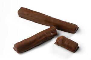 Delicious chocolate bars arranged creatively for a tempting treat in a bright setting photo