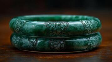 2 pair of green and white jade bangles arranged photo