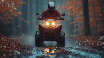 A person riding an atv through the woods photo