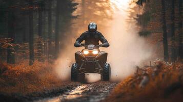 A person riding an atv through the woods photo