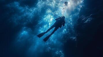 A scuba diver in the ocean photo