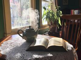 A serene scene featuring a steaming teapot beside an open book on a lace tablecloth, with sunlight streaming through a window and greenery in the background. photo