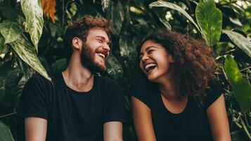 Emotional Value Concept. A joyful couple laughs together amidst lush green foliage, capturing a moment of happiness and connection in nature. photo