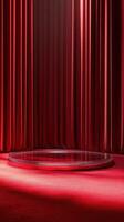 Stage setup with red curtains and circular platform awaiting performance in an elegant theater photo