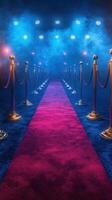 Red carpet event with golden stanchions and dramatic lighting in a fog-filled atmosphere photo