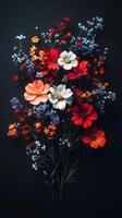 Brightly colored floral arrangement creates a stunning visual impact against a dark background in a creative display of nature's beauty photo