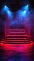 Colorful stage lit by blue and red lights with fog creating a dramatic atmosphere for performances photo