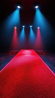 Red carpet event with colorful spotlights illuminating the venue at night photo