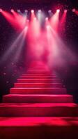 Red carpet staircase illuminated by vibrant lights creates a stunning visual effect in an elegant venue photo