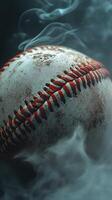 Baseball covered in smoke showcasing wear and age in a mysterious atmosphere photo