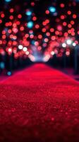 Red carpet event featuring sparkling lights and a glamorous atmosphere in an elegant venue photo