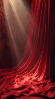 Rich red velvet drapes in a softly lit indoor setting create an elegant atmosphere with dramatic lighting photo