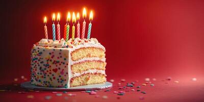 Celebrate a joyful birthday with a vibrant cake featuring six bright candles and colorful sprinkles surrounded by festive decorations photo