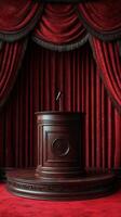 Elegant wooden podium with microphone in front of deep red curtains during a formal event setup photo