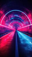Vibrant neon tunnel illuminated with pink and blue lights at night creating a mesmerizing visual experience photo