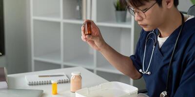 Medical student focused on medication management while studying in a modern workspace. photo