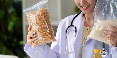 Dietitian analyzing nutritional data with food items on the table. photo